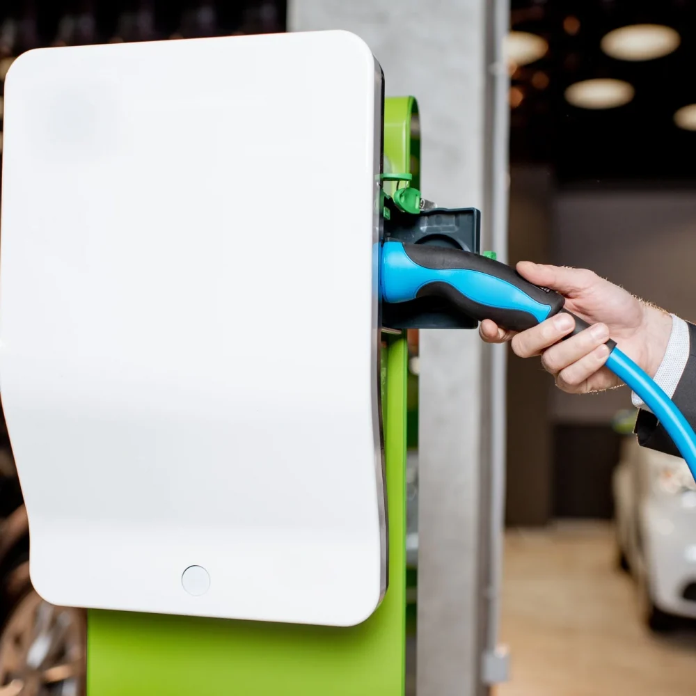 Plugging-cable-into-the-charging-station.jpg